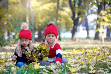 Happy two positive children playing together