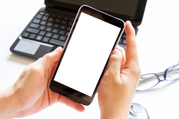 hand using mobile phone with blank screen