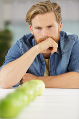 a man with five apples