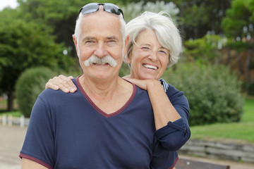 a happy senior couple outdoors
