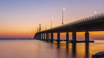 Al Hudariyat golden gate bridge at sunset - Powered by Adobe