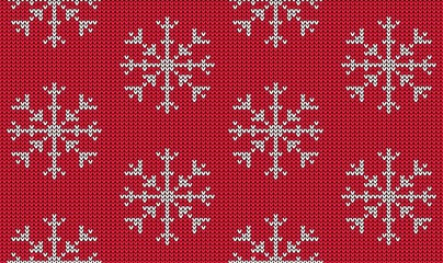 Knitted seamless pattern with white snowflake on red background. Christmas sweater ornament. Vector illustration.