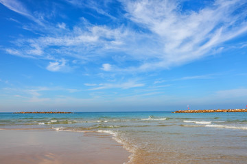 Gorgeous calm blue sea and free sand beaches of Tel Aviv. Beautiful sea surf and blue sky. Magical comfortable warm autumn mild season of Mediterranean 