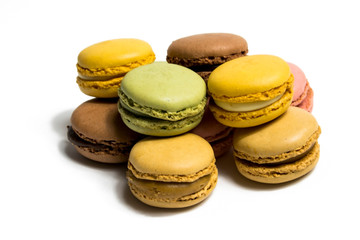 Colored macarons isolated on white background, typical French dish