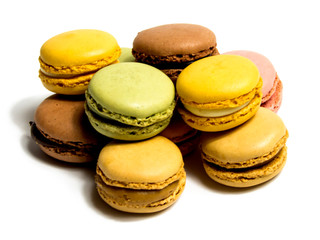 Colored macarons isolated on white background, typical French dish