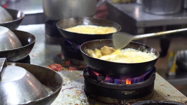 Traditional Indian, Pakistani handi dish being prepared - 4K