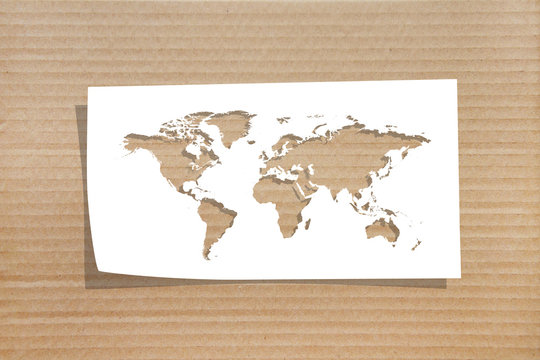 World map made from paper on cardboard background