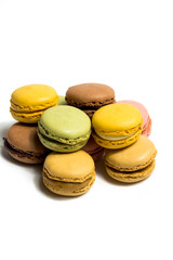 Colored macarons isolated on white background, typical French dish