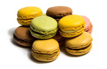 Colored macarons isolated on white background, typical French dish