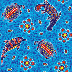 Australian aboriginal art seamless vector pattern with dolphin, turtle, platypus and other dotted typical elements