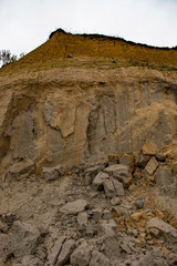 Nature background.  landslide on steep coastal cliffs . Sand and clay rocks