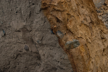 Nature background texture of sedimentary rocks, different sand layer