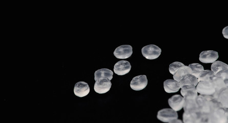 Polypropylene granule close-up background texture.