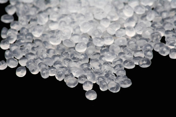 Polypropylene granule close-up background texture.