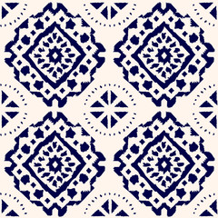 Fototapeta premium Abstract indigo shibori seamless vector pattern with ikat print of mosaic