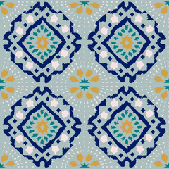 Geometric folk seamless vector pattern with ikat ethnic print of striped ornament