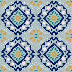 Geometric folk seamless vector pattern with ikat ethnic print of striped ornament