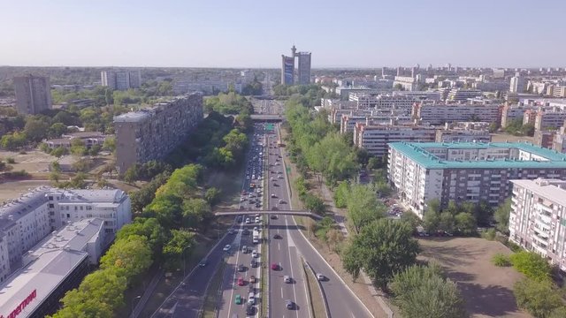 Cinematic 4k aerial shot of Roundabout and highway in Belgrade, Genex tower