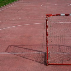 soccer goals sports equipment shadow silhouette on the field on the street
