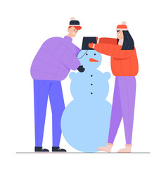 Young Man and Woman Wearing Warm Clothing Making Funny Snowman Put Bucket on his Head. Winter Time Outdoor Activity. People Playing on Christmas Holidays Vacation. Cartoon Flat Vector Illustration