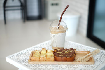 ิbread and coffee on the table