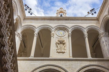 Architectural fragments of Sponza Palace - Magnificent 16th century Renaissance palace with an atrium and arched gallery, one of the most elegant venues of Dubrovnik. Croatia.