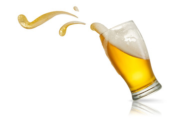 Beer splash in glass isolated on white