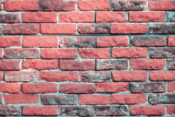 Texture of the old stained brickwork, copy space. Wasting away texture vintage green brick walls. Background of brick wall is orange with grey color.