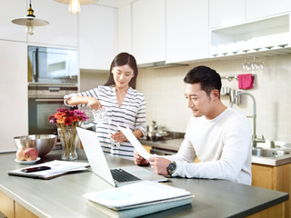young asian man working at home