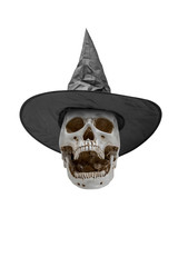 Human skull wearing witch hat