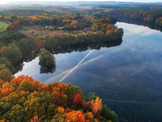 Landscape of the autumnal forest and lake in Poland