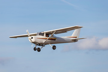 sports airplane flying mid air