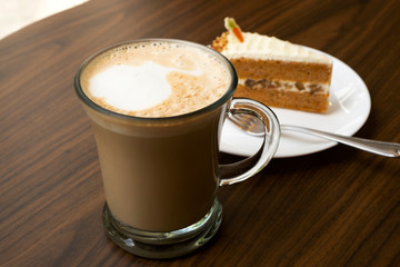 Hot coffee on a wooden table
