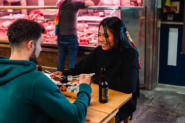asian girl eating in the japanese restaurant
