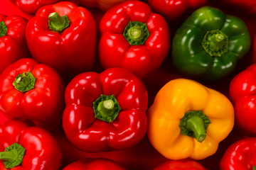 Fresh red, green, yellow bell pepper background.