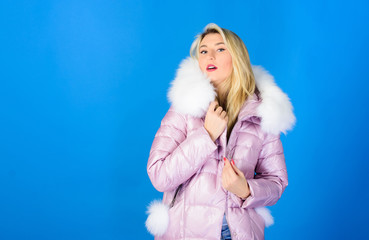Fashion environmental awareness. Faux fur is more than just trend. Winter clothes. Down jacket with...