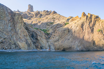 Fototapeta na wymiar Kara-Dag mountains, view of the rocks from the sea, Crimea, Russia.