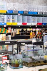 Large assortment of goods for aquarists and bird fanciers in modern pet shop