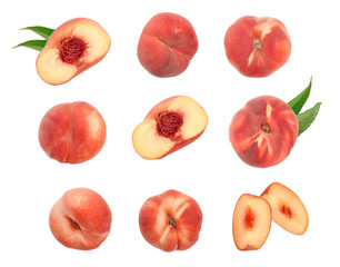 Ripe chinese flat peach fruit with leaf isolated on white background. Top view. Flat lay. Set or...
