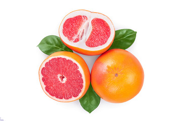 Grapefruit and slices with leaves isolated on white background. Top view. Flat lay