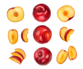 fresh red plum and half isolated on white background. Top view. Flat lay. Set or collection