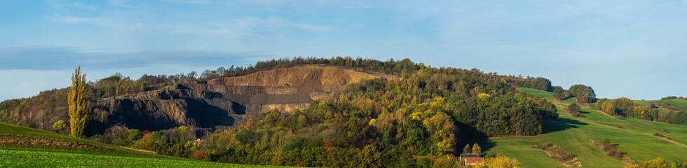 Fototapeta na wymiar panoramic view on old basalt quarry near Mittelherwigsdorf Germany at a hill called Scheibenberg