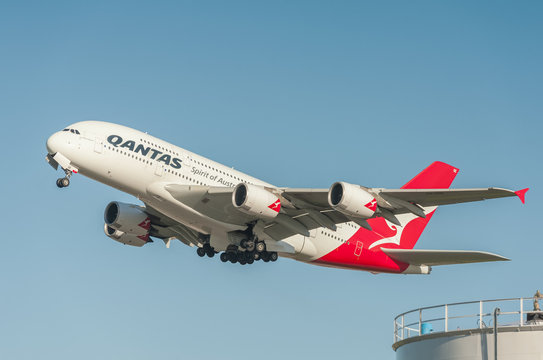 Qantas Airbus A380 departing into a crystal clear blue sky from London, Heathrow, UK - January 28, 2016