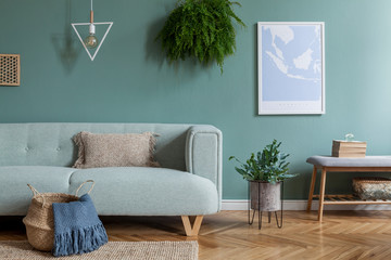 Stylish and scandinavian composition of living room interior with mint sofa, pillow, mock up poster frame, bench, books, plants and elegant accessories. Template. Cozy home decor. Eucalyptus color.