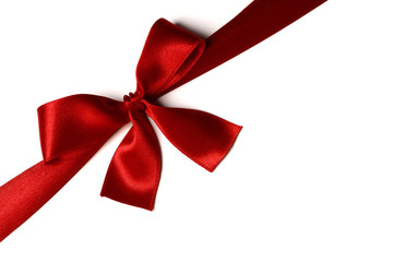 Red gift bow on white