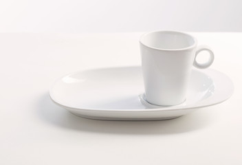 white cup on white white background