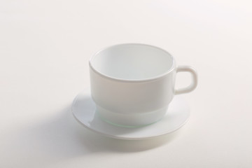 white cup on white white background