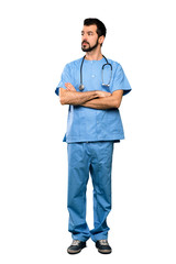 Full-length shot of Surgeon doctor man portrait over isolated white background