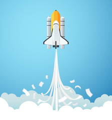 Paper art style of rocket flying to the sky through the clouds, Start up business concept
