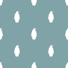 seamless pattern with antarctic penguin silhouettes. white standing pinguin ornament on powder blue.